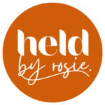Held by Rosie